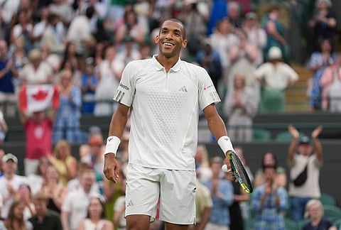 Felix Auger-Aliassime of Canada celebrates his victory against Dino Prizmic of Croatia in their second round men's singles match at the Wimbledon Tennis Championships in London, Wednesday, July 1, 2026.