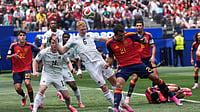 (AP Photo/Jae C. Hong) : Austria's Nicolas Seiwald (6) heads the ball next to Spain's Mikel Oyarzabal (21) during the World Cup round of 32 soccer match between Spain and Austria in Inglewood, Calif., near Los Angeles, Thursday, July 2, 2026.