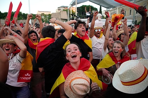 Spanish fans gathered in central Madrid celebrate Mikel Oyarzabal's goal during the World Cup round of 32 soccer match between Spain and Austria in Inglewood, California, near Los Angeles, Thursday, July 2, 2026.