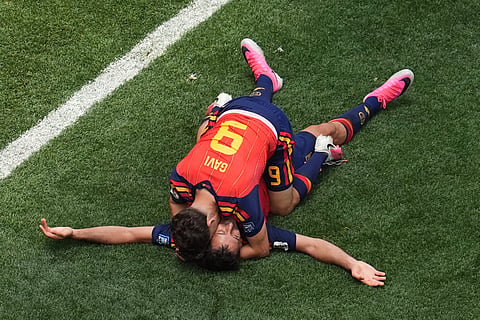 Spain's Gavi (9) congrats Mikel Oyarzabal after scored their side third goal during the World Cup round of 32 soccer match between Spain and Austria in Inglewood, Calif., near Los Angeles, Thursday, July 2, 2026.