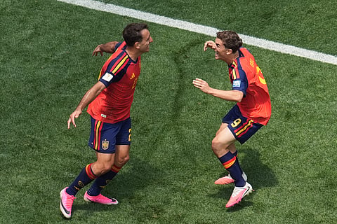 Spain's Mikel Oyarzabal, left, celebrates scoring his side's 3rd goal with his teammate Gavi during the World Cup round of 32 soccer match between Spain and Austria in Inglewood, Calif., near Los Angeles, Thursday, July 2, 2026.