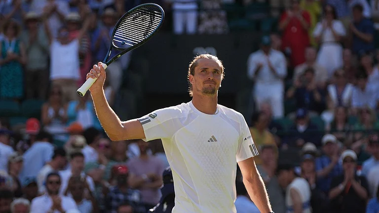 Alexander Zverev of Germany celebrates his victory against Valentin Royer of France in their second round men's singles match at the Wimbledon Tennis Championships in London, Thursday, July 2, 2026. - AP Photo/Maja Smiejkowska