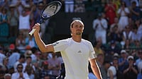 AP Photo/Maja Smiejkowska : Alexander Zverev of Germany celebrates his victory against Valentin Royer of France in their second round men's singles match at the Wimbledon Tennis Championships in London, Thursday, July 2, 2026. 