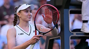 (AP Photo/Kirsty Wigglesworth) : Elena Rybakina of Kazakhstan celebrates winning the second round women's singles match against Caty Mcnally of the United States at the Wimbledon Tennis Championships in London, Thursday, July 2, 2026.