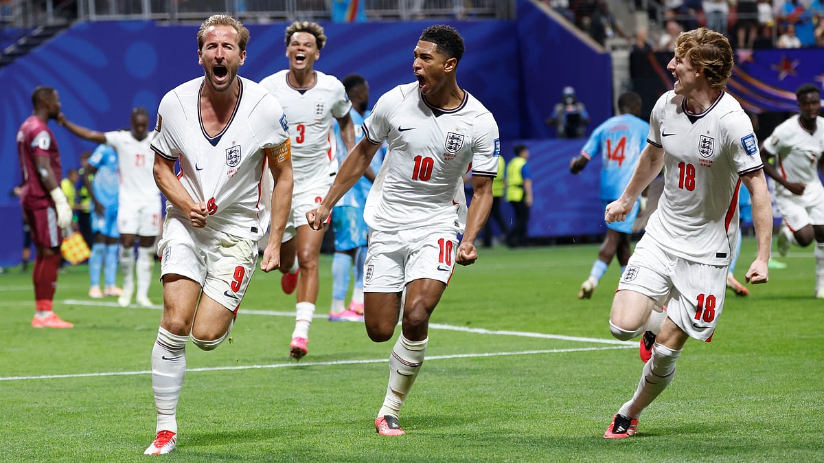 England's Harry Kane (9) celebrates after scoring his side's first goal next to his teammate Jude Bellingham (10) and Anthony Gordon (18) during the World Cup round of 32 soccer match between England and Congo in Atlanta, Wednesday, July 1, 2026 - (AP Photo/Butch Dill)