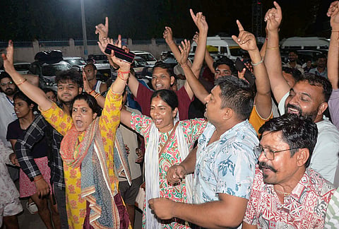 People raise religious slogans as the first batch of Amarnath Yatra pilgrims leave from Bhagwati Nagar Yatri Niwas base camp, in Jammu, Jammu and Kashmir.