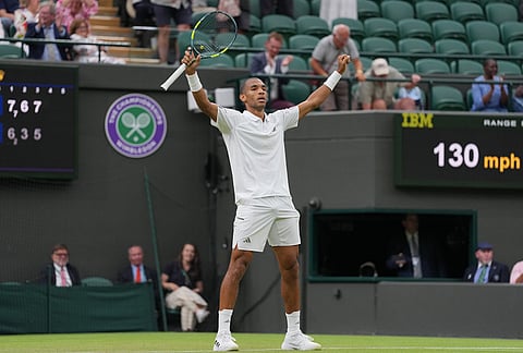 Felix Auger-Aliassime of Canada celebrates his victory against Dino Prizmic of Croatia in their second round men's singles match at the Wimbledon Tennis Championships in London, Wednesday, July 1, 2026. 