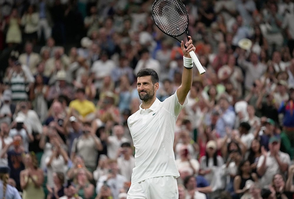 Novak Djokovic of Serbia celebrates his victory against Stefanos Tsitsipas of Greece in their second round men's singles match at the Wimbledon Tennis Championships in London, Wednesday, July 1, 2026.  - | Photo: AP/Brian Inganga