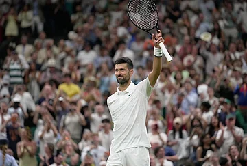 | Photo: AP/Brian Inganga : Novak Djokovic of Serbia celebrates his victory against Stefanos Tsitsipas of Greece in their second round men's singles match at the Wimbledon Tennis Championships in London, Wednesday, July 1, 2026.