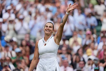 | Photo: AP/Kin Cheung : Aryna Sabalenka of Belarus celebrates her victory against McCartney Kessler of the United States in their second round women's singles match, at Wimbledon Tennis Championships in London, Wednesday, July 1, 2026.