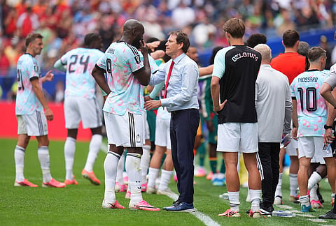 Belgium head coach Rudi Garcia talks to his players during the World Cup round of 32 soccer match between Belgium and Senegal in Seattle, Wednesday, July 1, 2026. 