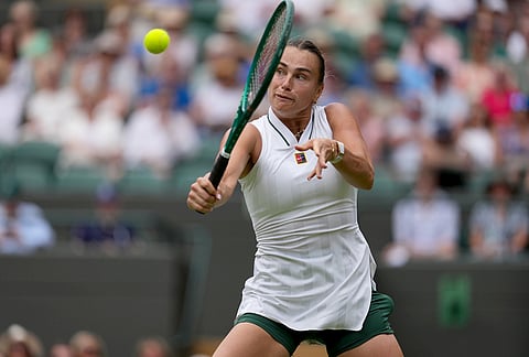 Aryna Sabalenka of Belarus returns the ball to McCartney Kessler of the United States in their second round women's singles match at the Wimbledon Tennis Championships in London, Wednesday, July 1, 2026.