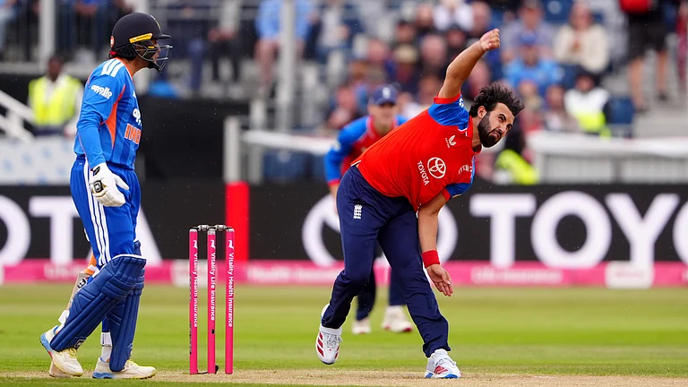 England's Saqib Mahmood bowls during the first IT20 cricket match at Chester-le-Street, England, Wednesday July 1, 2026 - (Owen Humphreys/PA via AP)