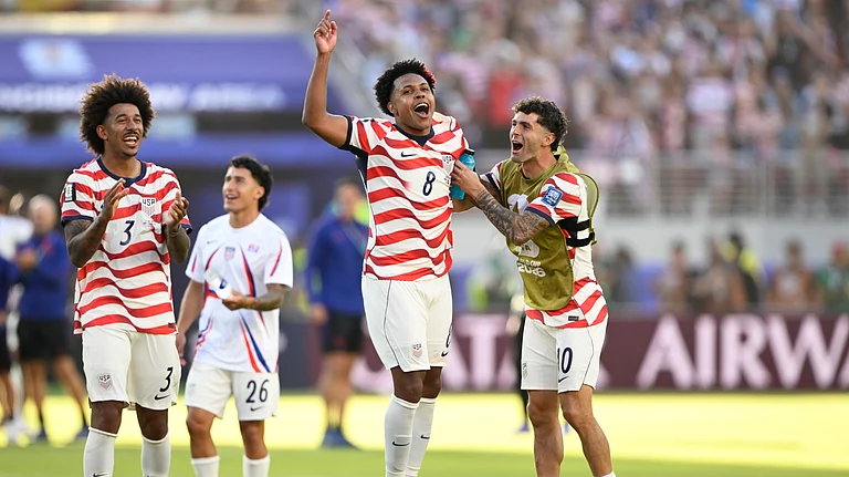 United States' Weston McKennie (8) and Christian Pulisic (10) celebrate winning the World Cup round of 32 soccer match between the United States and Bosnia in Santa Clara, Calif., near San Francisco, Wednesday, July 1, 2026 - (AP Photo/Eakin Howard)