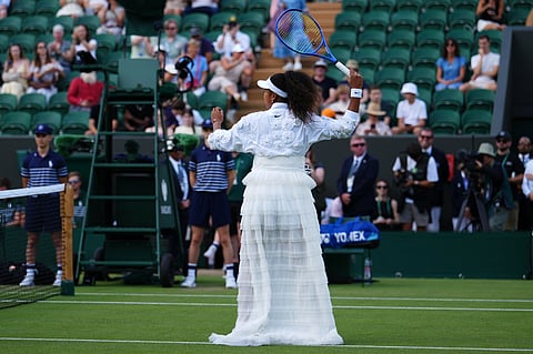 Naomi Osaka of Japan enters the court for the second round women's singles match against Anastasia Gasanova of Russia at the Wimbledon Tennis Championships in London, Wednesday, July 1, 2026.