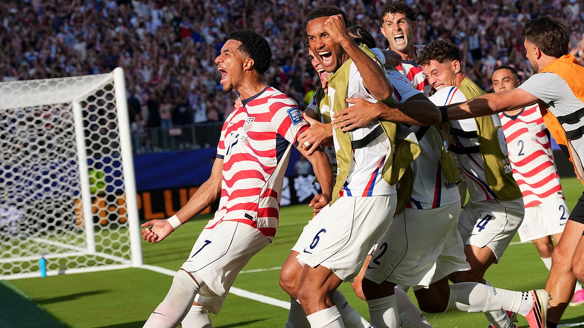 United States' Malik Tillman (17) celebrates with teammates after scoring on a free kick during the World Cup round of 32 soccer match between the United States and Bosnia in Santa Clara, Calif., near San Francisco, Wednesday, July 1, 2026 - (AP Photo/Martin Meissner)