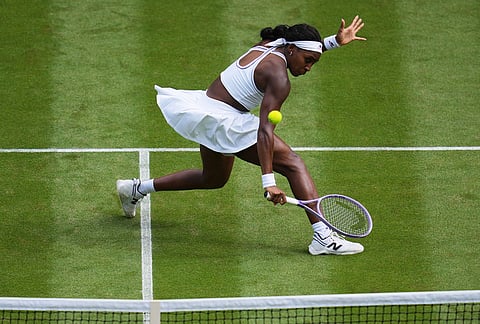 Coco Gauff of the United States returns the ball to Solana Sierra of Argentina in their second round women's singles match at the Wimbledon Tennis Championships in London, Wednesday, July 1, 2026.