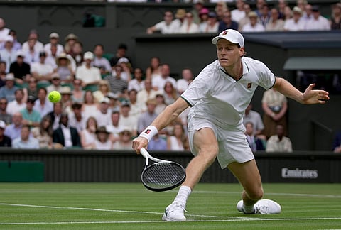 Jannik Sinner of Italy returns the ball to Nuno Borges of Portugal in their second round men's singles match at the Wimbledon Tennis Championships in London, Wednesday, July 1, 2026.