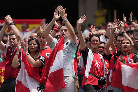 Fans of Austria applaud the team after the World Cup round of 32 soccer match between Spain and Austria in Inglewood, Calif., near Los Angeles, Thursday, July 2, 2026.