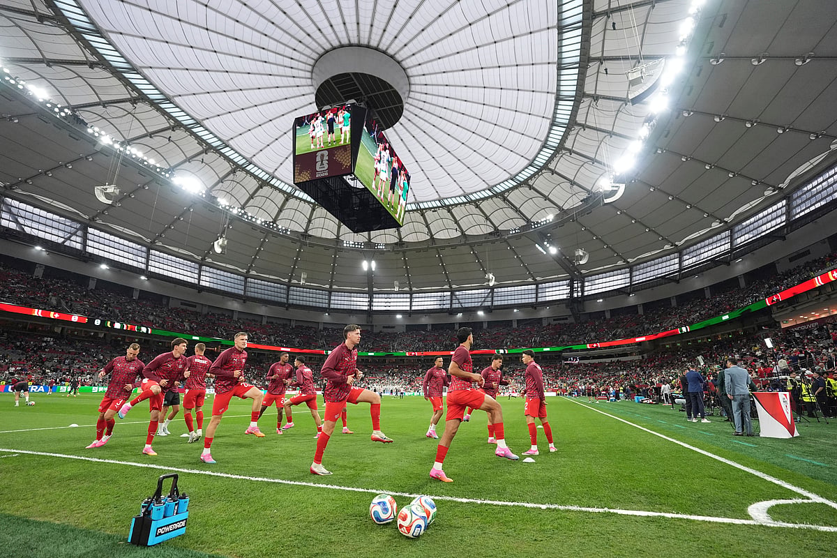 (AP Photo/Abbie Parr) : Switzerland players warm up before the start of the World Cup round of 32 soccer match between Switzerland and Algeria in Vancouver, British Columbia, Thursday, July 2, 2026