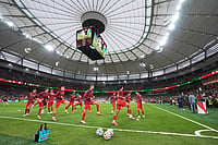 (AP Photo/Abbie Parr) : Switzerland players warm up before the start of the World Cup round of 32 soccer match between Switzerland and Algeria in Vancouver, British Columbia, Thursday, July 2, 2026