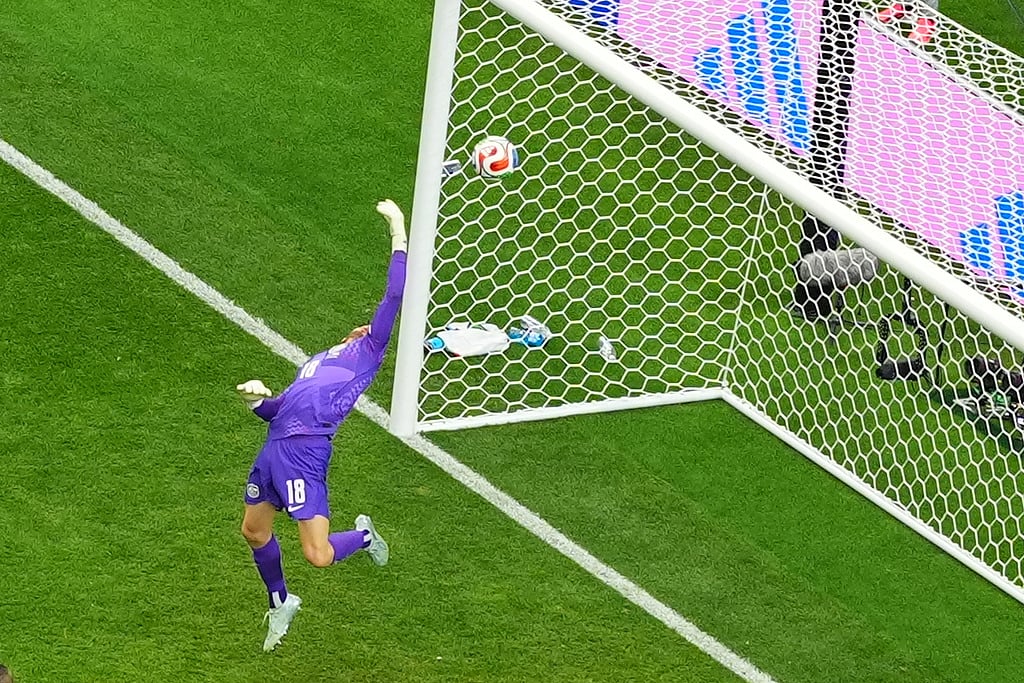 Australia goalkeeper Patrick Beach (18) saves during the World Cup round of 32 soccer match between Australia and Egypt in Arlington