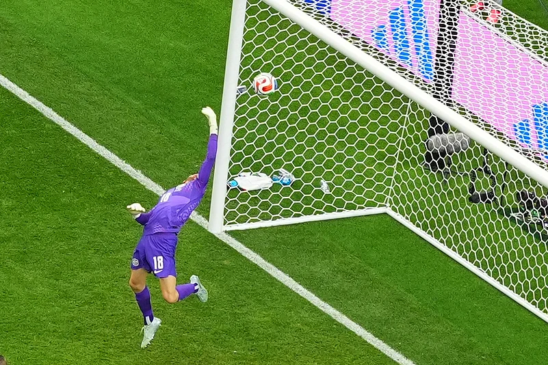 Australia goalkeeper Patrick Beach (18) saves during the World Cup round of 32 soccer match between Australia and Egypt in Arlington