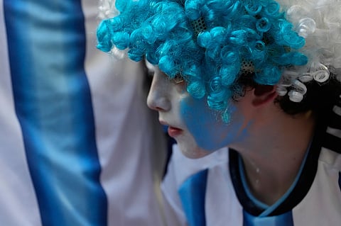 An Argentina fan looks on before the World Cup round of 32 soccer match between Argentina and Cape Verde in Miami Gardens