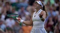 (AP Photo/Brian Inganga) : Mirra Andreeva of Russia reacts after losing a point against Barbora Krejcikova of Czech Republic in their second round women's singles match at the Wimbledon Tennis Championships in London, Wednesday, July 1, 2026