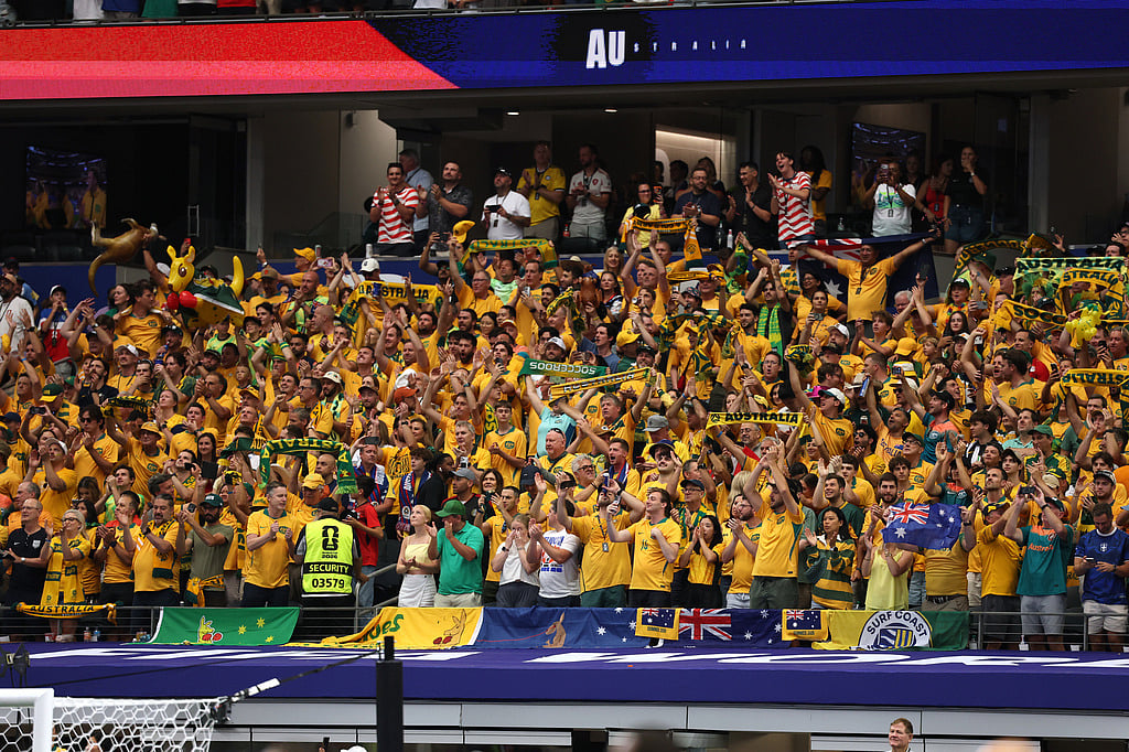 Australia fans cheer during the World Cup round of 32 soccer match between Australia and Egypt in Arlington
