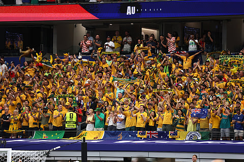 Australia fans cheer during the World Cup round of 32 soccer match between Australia and Egypt in Arlington