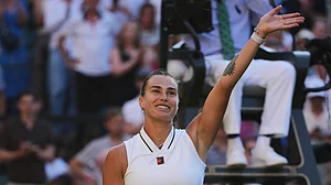 (AP Photo/Kin Cheung) : Aryna Sabalenka of Belarus celebrates her victory against Jelena Ostapenko of Latvia in their third round women's singles match at the Wimbledon Tennis Championships in London, Friday, July 3, 2026.