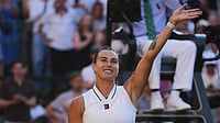 (AP Photo/Kin Cheung) : Aryna Sabalenka of Belarus celebrates her victory against Jelena Ostapenko of Latvia in their third round women's singles match at the Wimbledon Tennis Championships in London, Friday, July 3, 2026.