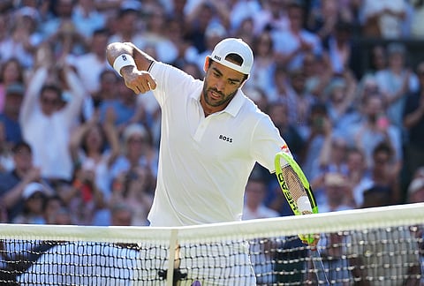 Matteo Berrettini of Italy celebrates winning the second round men's singles match against Arthur Fils of France at the Wimbledon Tennis Championships in London, Thursday, July 2, 2026.