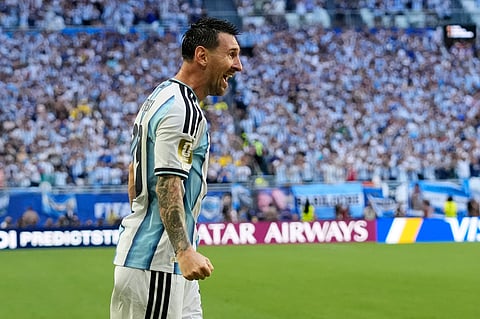 Argentina's Lionel Messi celebrates after scoring the opening goal against Cape Verde during the World Cup round of 32 soccer match in Miami Garden