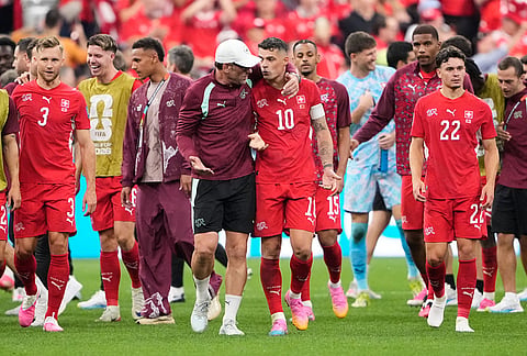 Swiss players react following the World Cup round of 32 soccer match between Switzerland and Algeria in Vancouver, British Columbia, Thursday, July 2, 2026. 