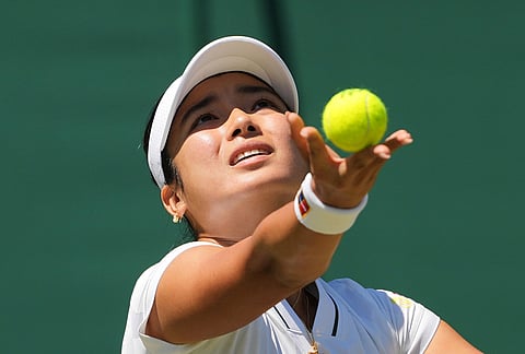 Alexandra Eala of the Philippines serves the ball during the second round women's singles match against Maya Joint of Australia at the Wimbledon Tennis Championships in London, Thursday, July 2, 2026.