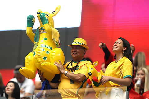 Australia fans hold inflatable kangaroos before the World Cup round of 32 soccer match between Australia and Egypt in Arlington