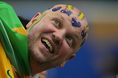 A fan of Australia cheer ahead of a World Cup round of 32 soccer match between Australia and Egypt in Arlington