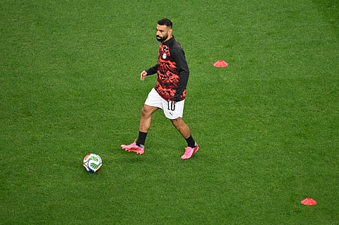 Egypt's Mohamed Salah (10) warms up for the World Cup round of 32 soccer match between Australia and Egypt in Arlington