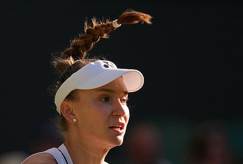 Elena Rybakina of Kazakhstan concentrates during the second round women's singles match against Caty Mcnally of the United States at the Wimbledon Tennis Championships in London, Thursday, July 2, 2026.