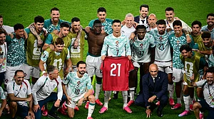 (Sammy Kogan/The Canadian Press via AP) : Portugal's Cristiano Ronaldo (7), joined by teammates, holds the jersey of the late Diogo Jota, who died last year, after the World Cup round of 32 soccer match between Portugal and Croatia in Toronto, Thursday, July 2, 2026.