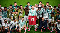 (Sammy Kogan/The Canadian Press via AP) : Portugal's Cristiano Ronaldo (7), joined by teammates, holds the jersey of the late Diogo Jota, who died last year, after the World Cup round of 32 soccer match between Portugal and Croatia in Toronto, Thursday, July 2, 2026.
