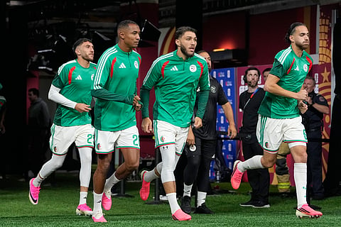 Algerian players run onto the pitch to warm up ahead of the World Cup round of 32 soccer match between Switzerland and Algeria in Vancouver, British Columbia, Thursday, July 2, 2026