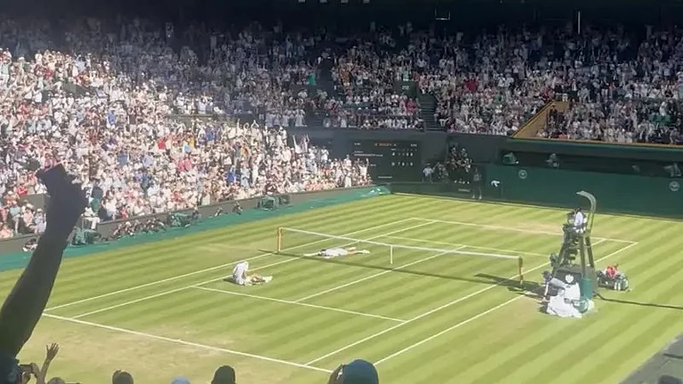 In frame, both Novak Djokovic and Arthur Rinderknech ended on the floor after giving everything in that final point, What a perfect way to end a match.. - AP