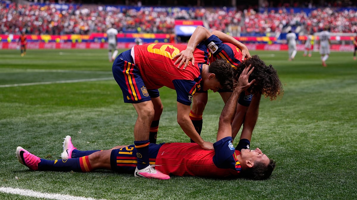 Spain's Mikel Oyarzabal (21) celebrates scoring his side's third goal against Austria with teammates Gavi (9) and Marc Cucurella during the World Cup round of 32 soccer match in Inglewood, Calif., near Los Angeles, Thursday, July 2, 2026. - (AP Photo/Mark J. Terrill)