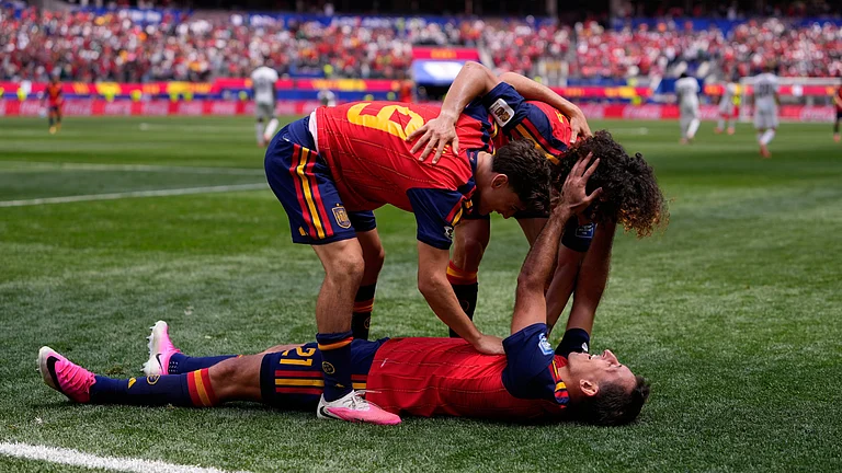 Spain's Mikel Oyarzabal (21) celebrates scoring his side's third goal against Austria with teammates Gavi (9) and Marc Cucurella during the World Cup round of 32 soccer match in Inglewood, Calif., near Los Angeles, Thursday, July 2, 2026. - (AP Photo/Mark J. Terrill)