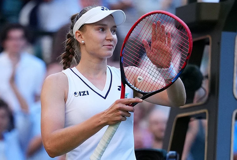 Elena Rybakina of Kazakhstan celebrates winning the second round women's singles match against Caty Mcnally of the United States at the Wimbledon Tennis Championships in London, Thursday, July 2, 2026. - | Photo: AP/Kirsty Wigglesworth