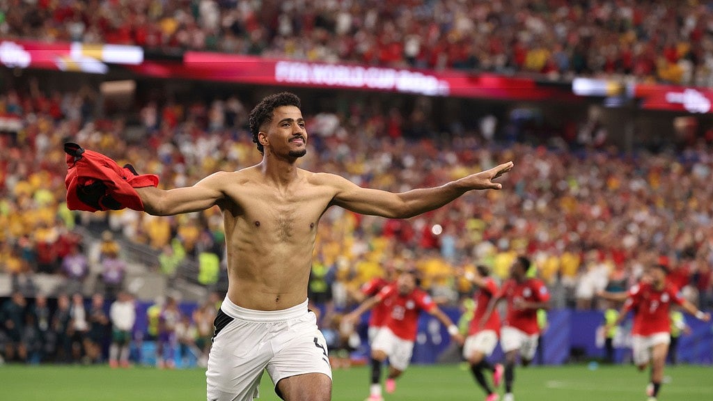 Egypt's Hossam Abdelmaguid (4) celebrates after scoring the winning penalty during World Cup round of 32 soccer match between Australia and Egypt in Arlington. - Sam Hodde/AP Photo