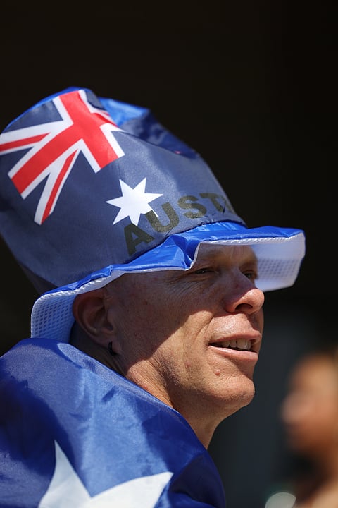 An Australia fan looks on outside the stadium before the World Cup round of 32 soccer match between Australia and Egypt in Arlington